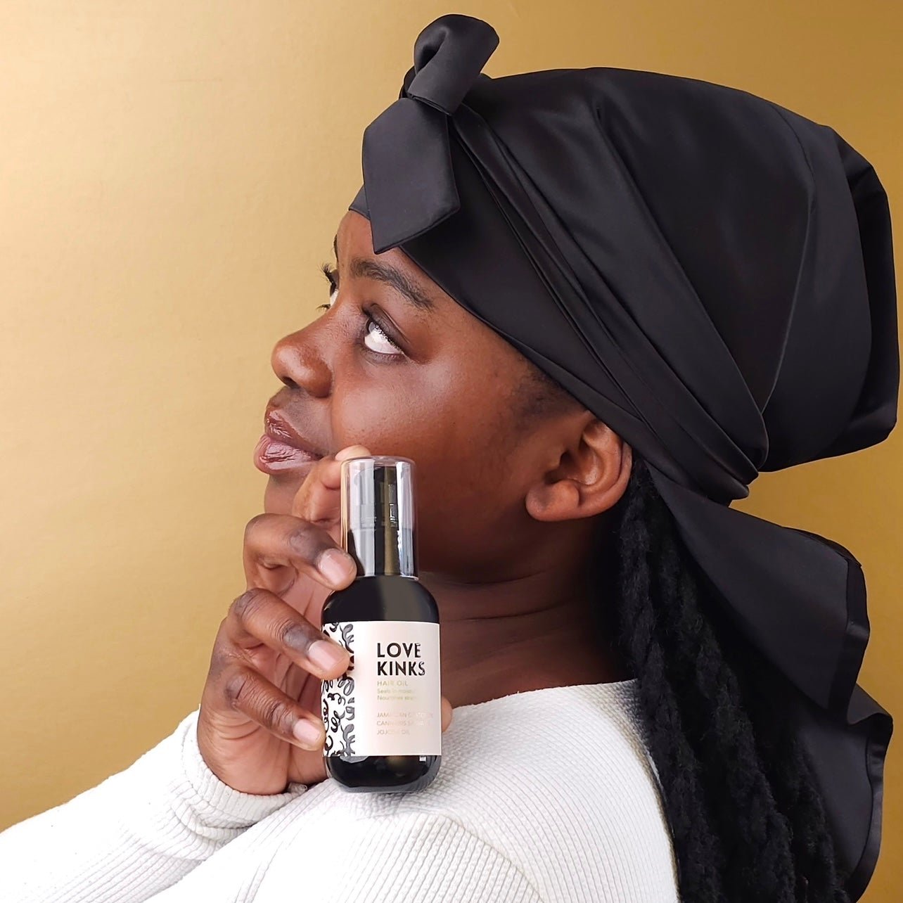 Hair Oil with Jamaican Castor Oil, Cannabis Sativa Oil and Jojoba Oil. Fragranced